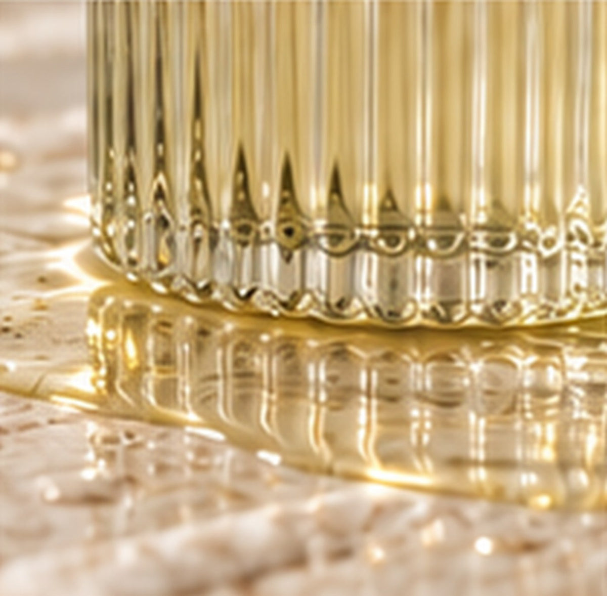 Close detail of the ribbed glass bottle